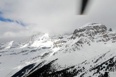 22 Mount Assiniboine With Summit In Clouds, Terrapin Mountain From Helicopter In Winter.jpg